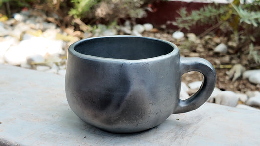 taza redonda para liquidos de barro negro